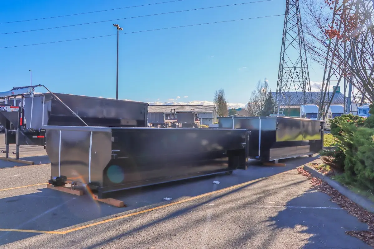 Roll-off dumpster ready for waste disposal at job site for Concrete Dumpster Rental in Port Lavaca